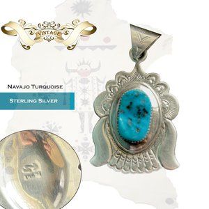 Vintage Sterling Silver Navajo blue turquoise pendant.